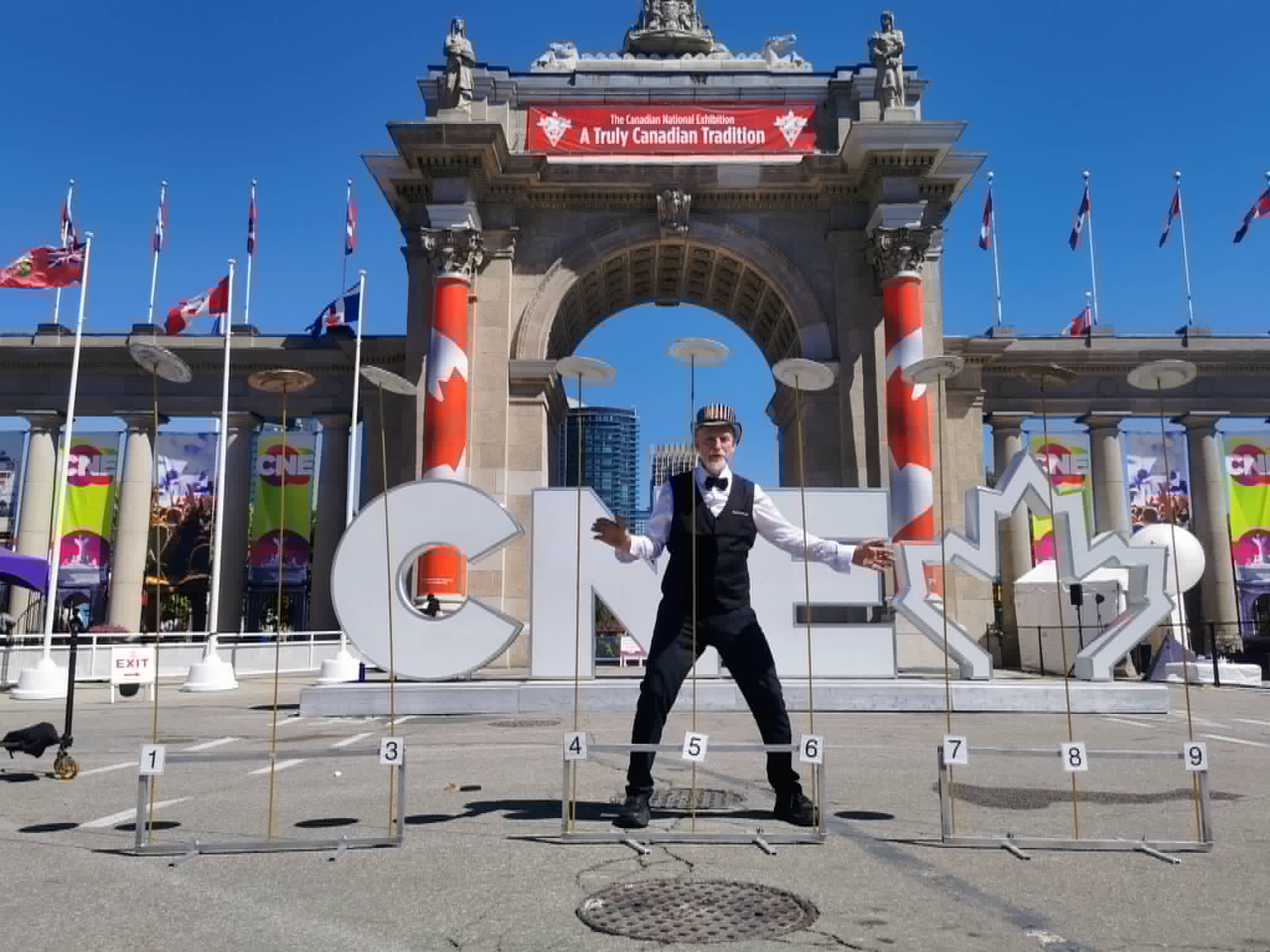 Nine spinning plates in front of the Princes' Gates at the Canadian National Exhibition, Toronto