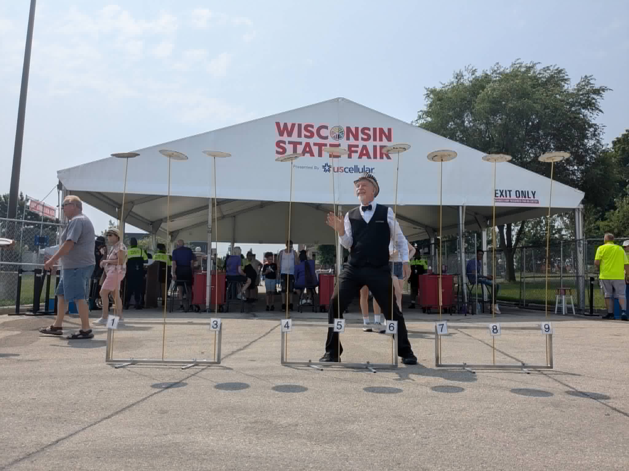 John Park spinning nine plates at the Wisconsin State Fair